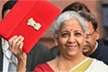 Sitharaman takes Tablet in red pouch to present paperless budget